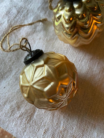A Set of Golden Glass Baubles